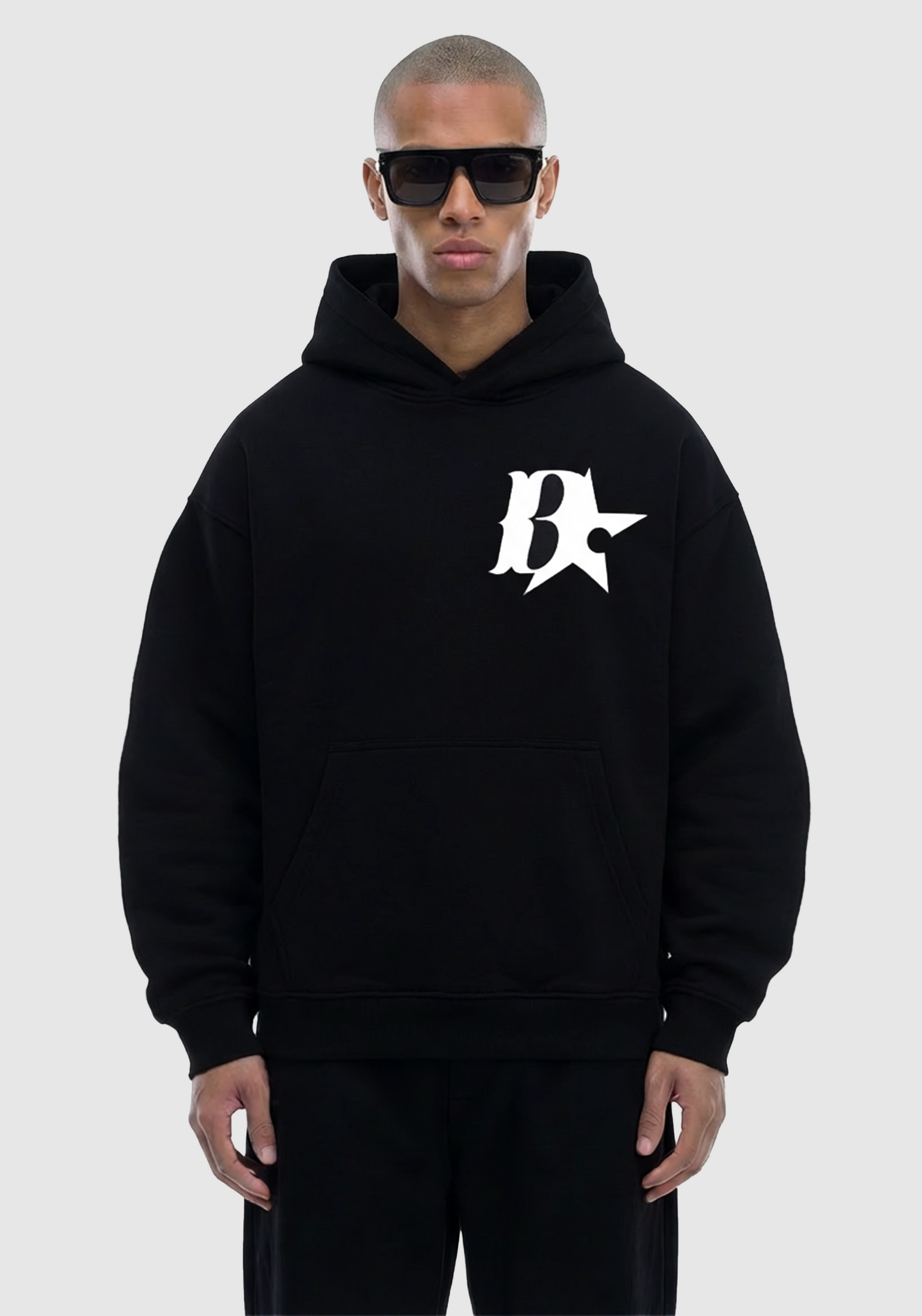 Model wearing Back & Forth star logo hoodie