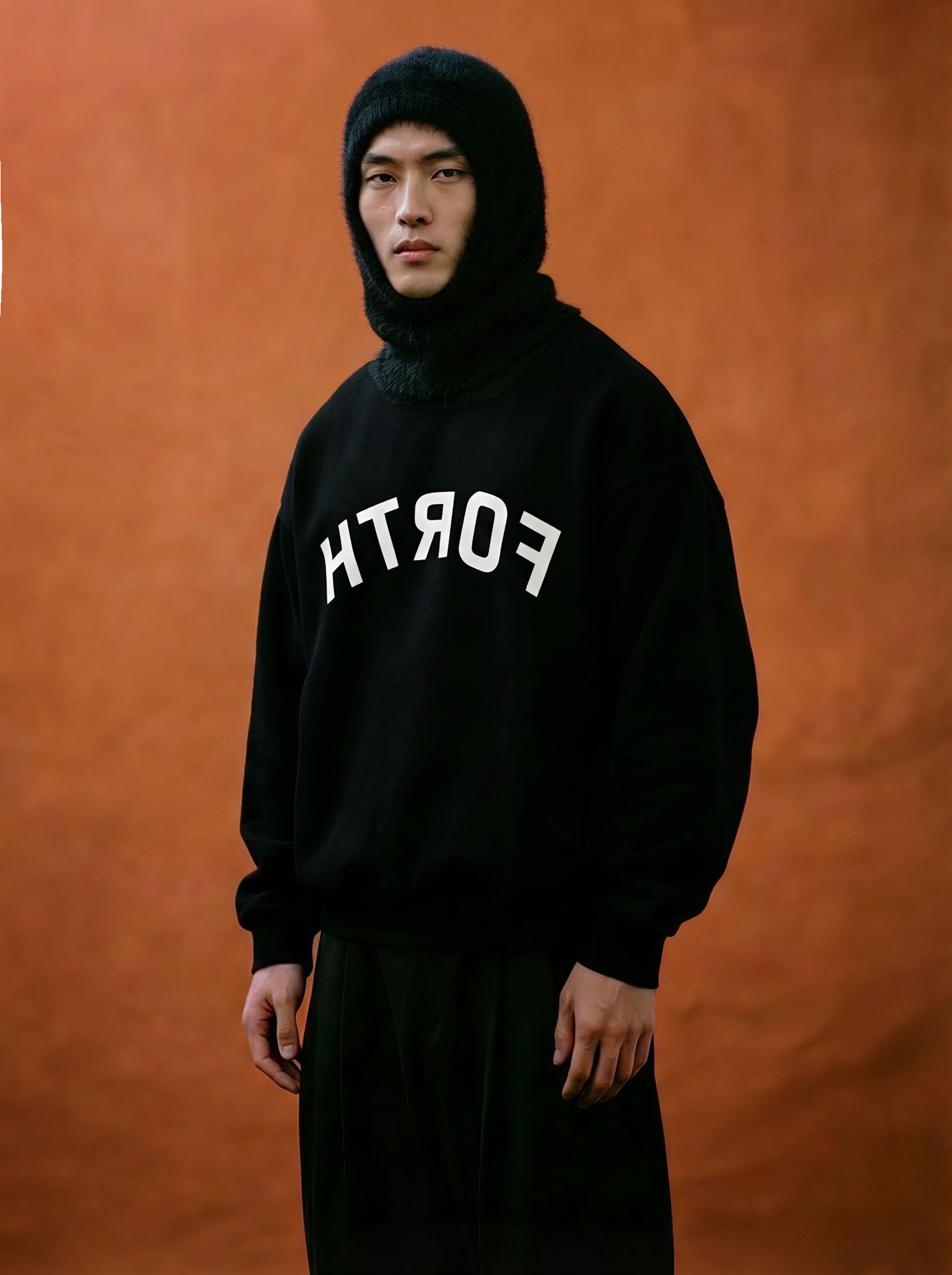 model wearing boxy sweatshirt by back & forth