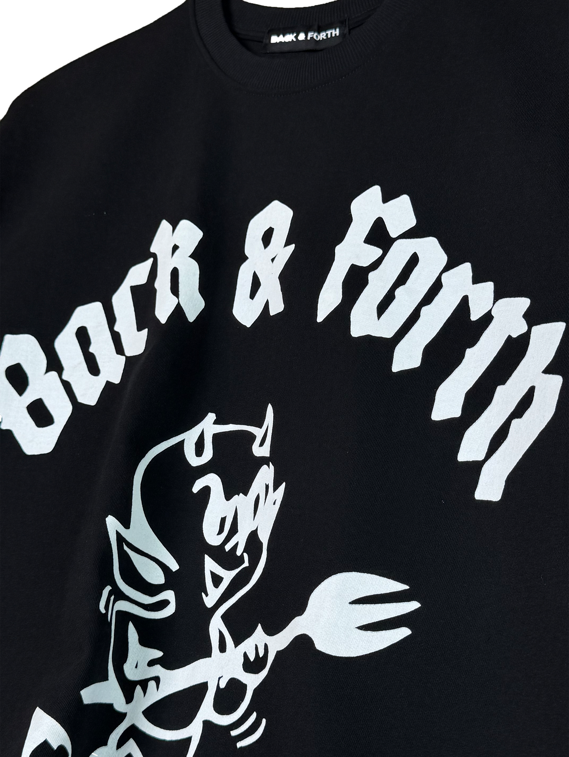 Black sweatshirt with 'Back & Forth' text and graphic design on a white background
